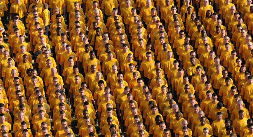 Men and women stood together in uniform