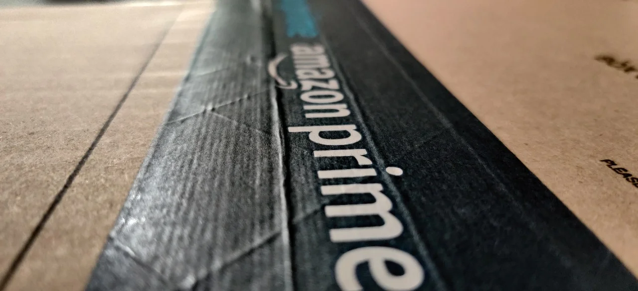 Cardboard delivery box with Amazon Prime branding